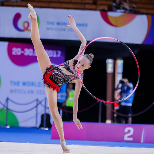 Athlete performing with a hoola hoop.