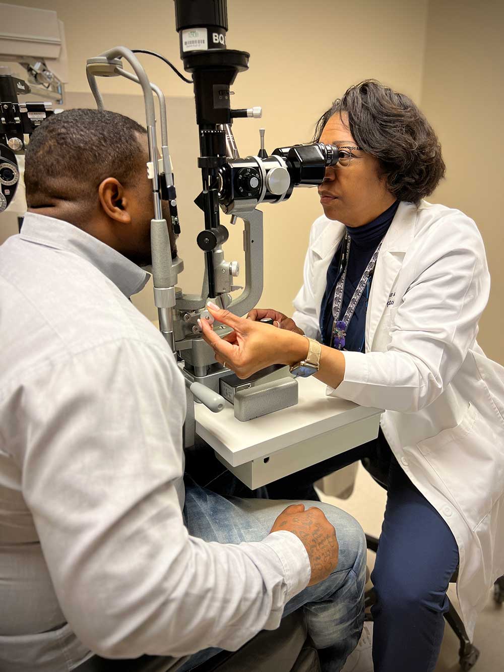 Dr. Sims with patient