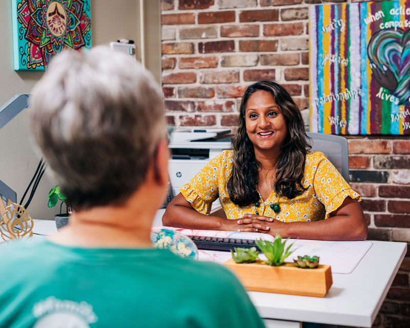 Benevolent Fund employee interviewing a UAB employee.