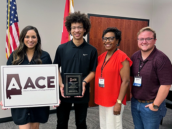 Members of Collat's Career Center team displaying awards