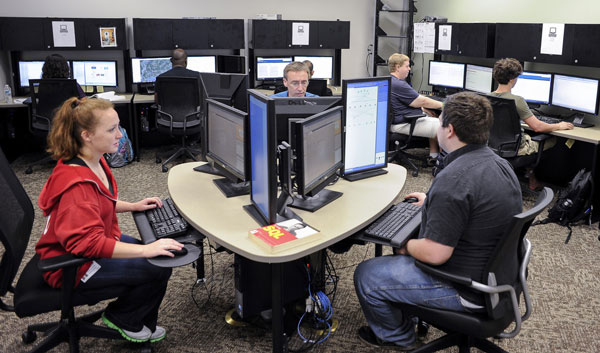 Several students in a UAB CIS computer lab. 