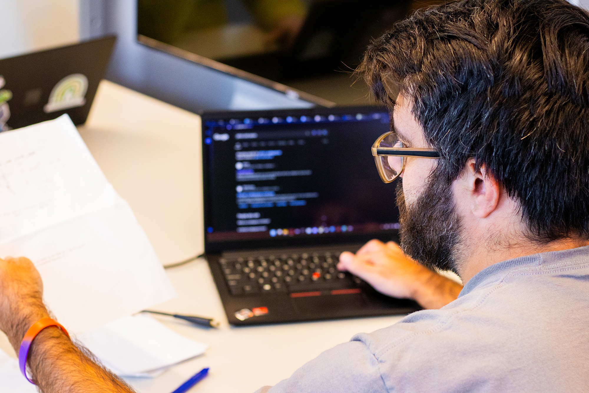 Student working at a computer screen. 