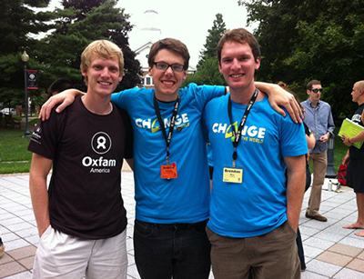 Brian Rice, left, and his brother Brendan Rice, right, with another Oxfam CHANGE Initiative trainee, center, in Boston in 2012. 