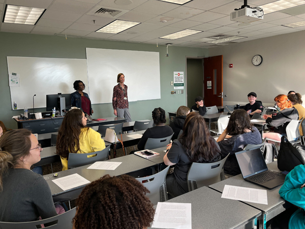 Drs. Gezon and Mwenesongole bring their classes together for the first time