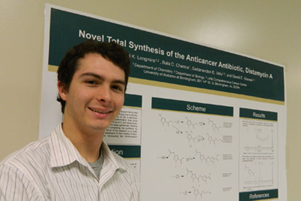 Michael Longmire with poster