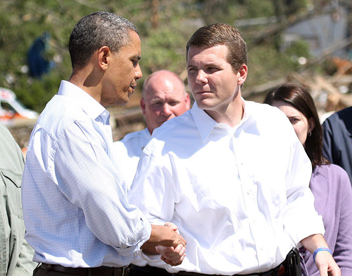 Image of President Obama and Maddox touring tornado-damaged Tuscaloosa. 