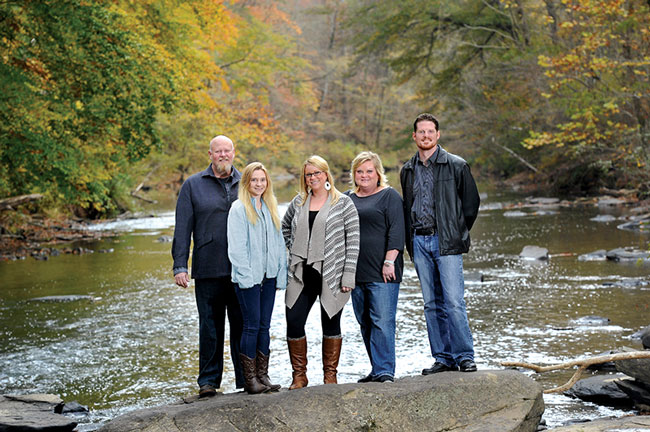 UAB graphic design professor Doug Barrett with students Jennifer Waycaster, Samantha Gibbons, Amy Clark, and Daniel Twieg at the Cahaba River.