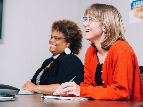 Photo of Department of Social Work faculty smiling during a presentation