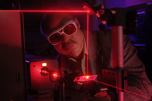 Sergey Mirov conducting experiment