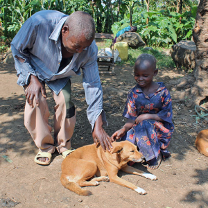 Girl petting dog