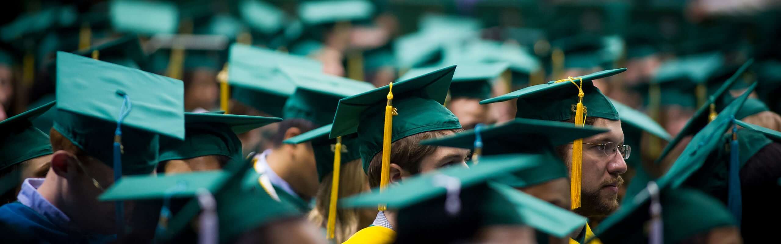 student at commencement ceremony