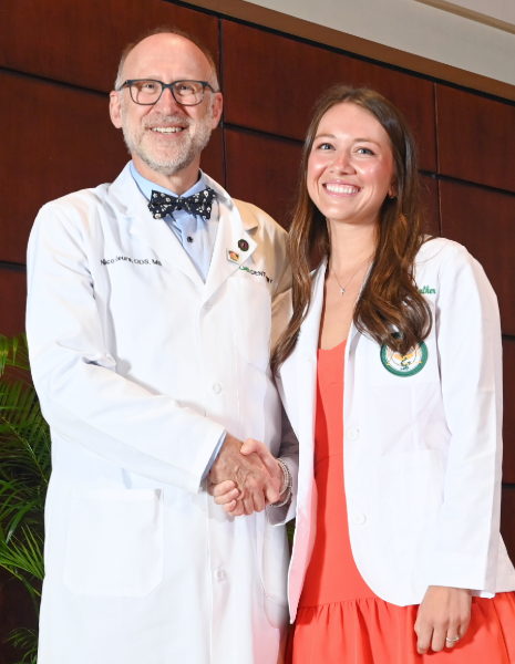 Ella Brannen Walker with Dean Geurs at her White Coat Ceremony