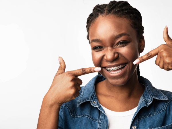 Stock photo of woman with braces by prostock studio from Adobe Stock