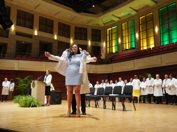 Student receiving their white coat at 2024 UAB SOD White Coat Ceremony