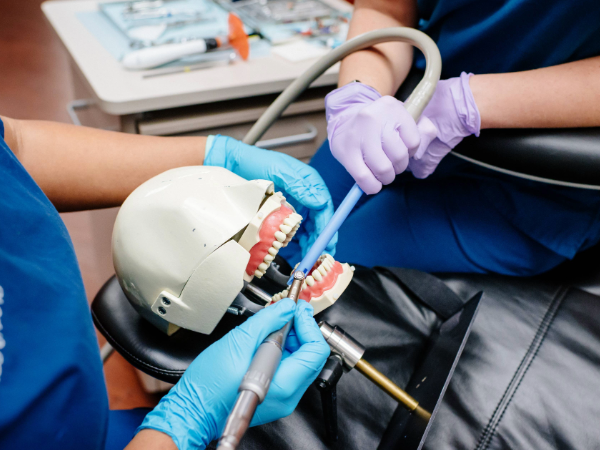 UAB SOD Dental Assisting Program students training on dummy