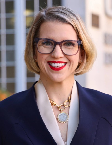 Maria (Mia) Geisinger - Headshot of woman in professional attire