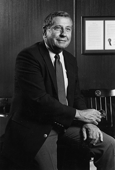 Jacob Martin sitting outside the School of Dentistry.
