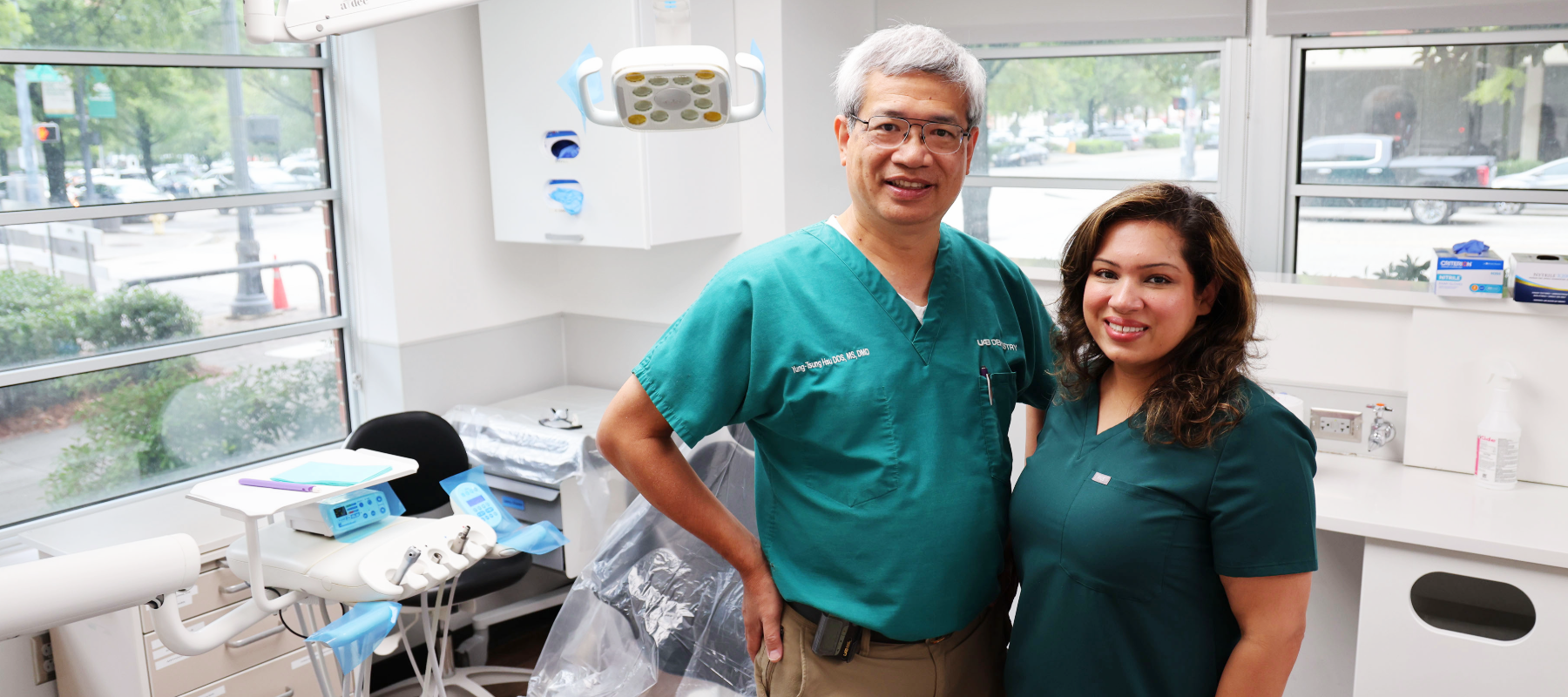 Dr. Hsu and Dr. Upton standing together for photo in dental clinic