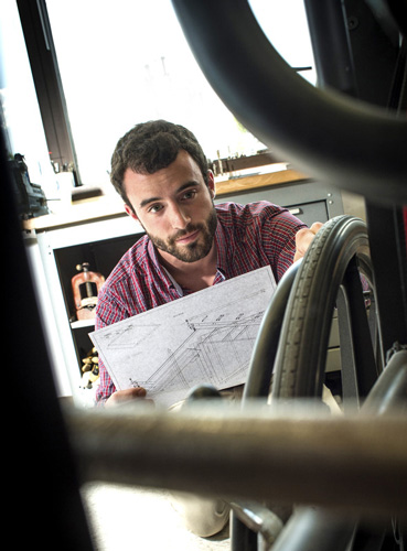 Brandon Sherrod works on a Scale-Metrix Wheelchair Scale project. 