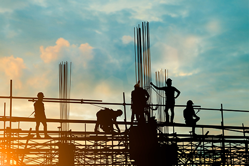 Workers constructing a building.