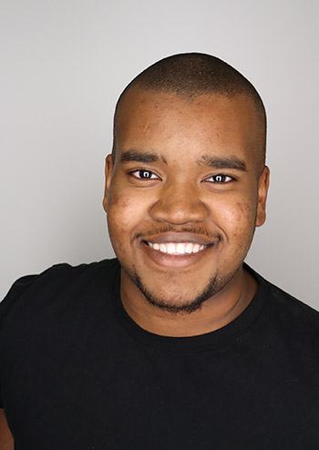 Professional headshot of Taha Mohmoud