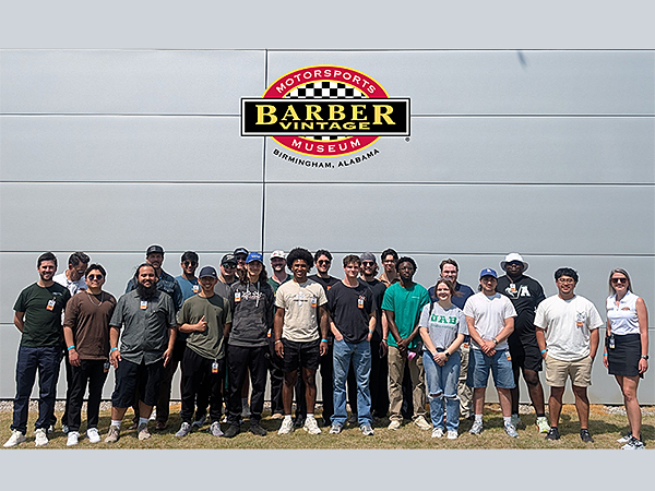 Group photo outside Barber Vintage Motorsports Museum
