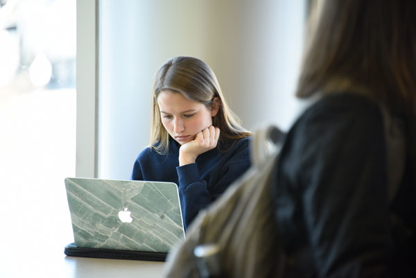 Student using laptop.