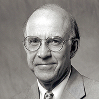 William E. Dismukes, MD