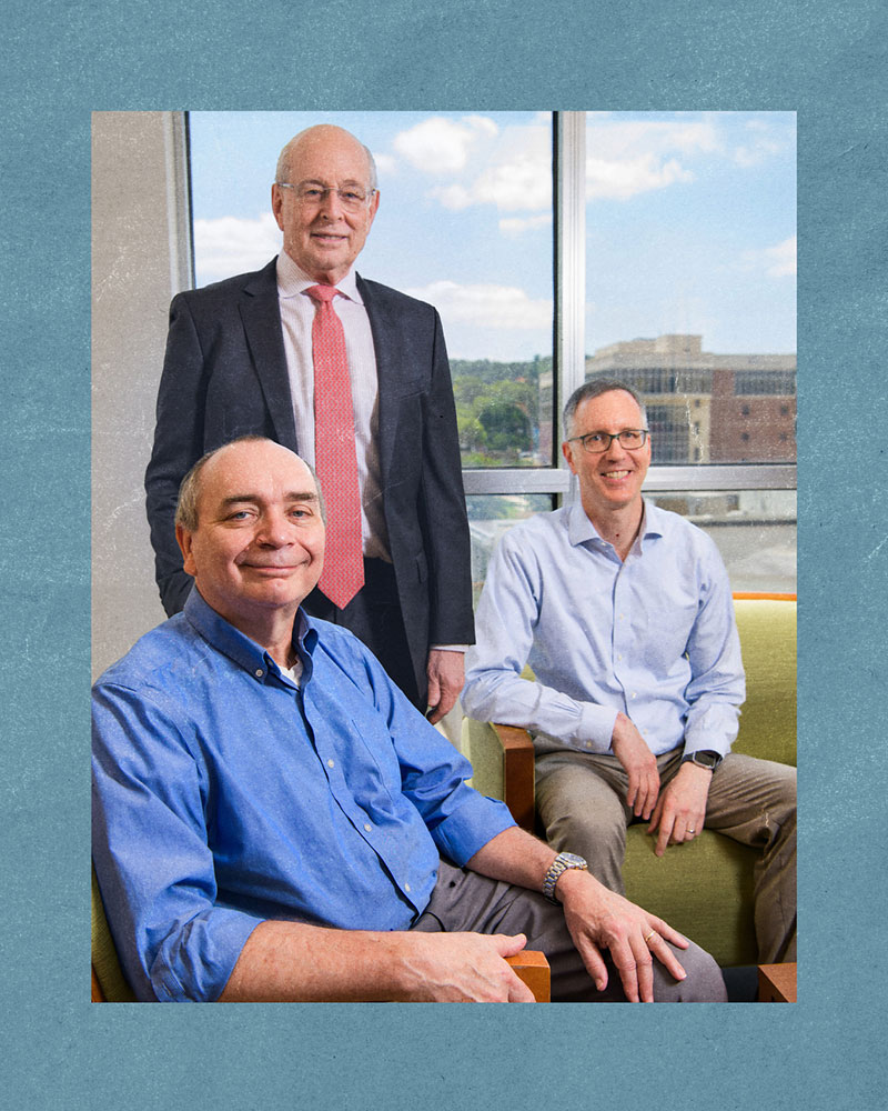 Ronald Lazar, Ph.D., Erik Roberson, M.D., Ph.D., and David Geldmacher, M.D., sit for a group portrait in the new Brain Aging and Memory Hub at UAB.