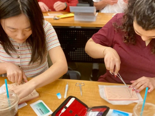 Medical student work on a procedure