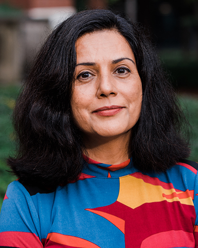 Environmental headshot of Dr. Nita LImdi, PhD (Professor, Neurology), October 2021.