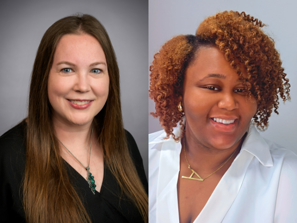 Two professional women, the one on the right wearing a black dress shirt, and the one on the left wearing a white dress shirt.