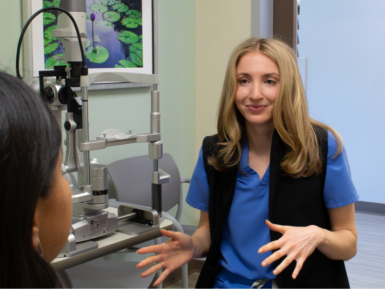 A female optometrist talking to a patient