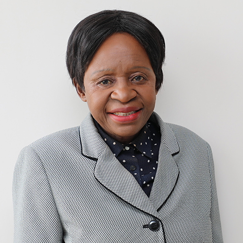 Headshot of Elwyn Chomba, M.D., professor in the Department of Pediatrics and Inaugural Vice Chancellor of Levy Mwanawasa Medical University since 2019