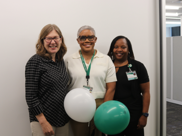 LaNeitria Head and colleagues pose with balloons