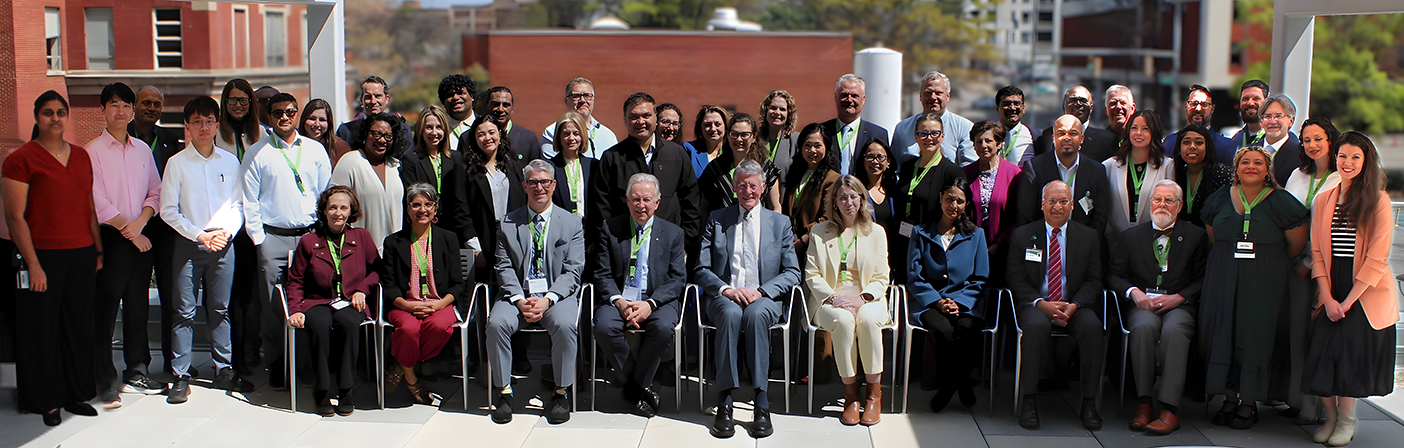 approximately 50 UAB and McMaster committee members gathered on the ALGEN balcony for a group photo