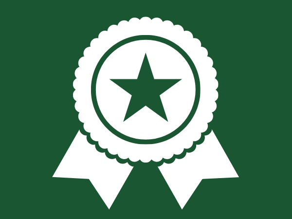 White award ribbon on a green background