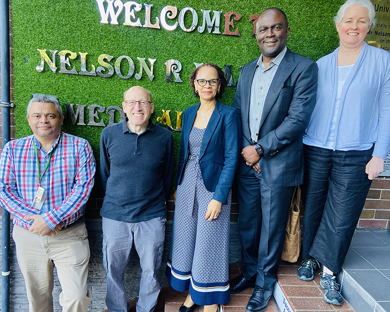 Dr. Tita with Prof. Sebitloane (middle), and faculty and colleagues who attended the grand rounds at UKZN 