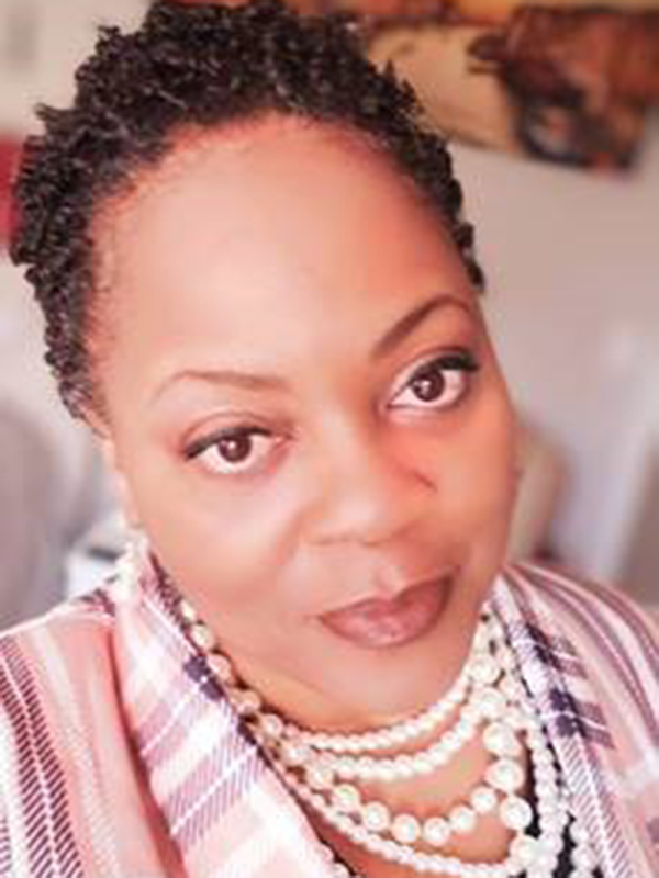 Headshot of Benita