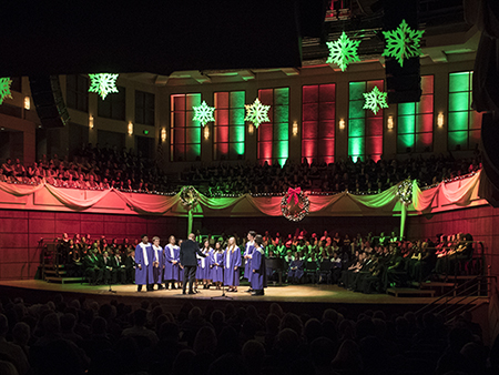 Overall of "Christmas at the Alys", a concert presented by the College of Arts and Sciences' Department of Music, featuring hundreds of singers as the UAB choirs and Trumpet Ensemble are joined by the Steel City Men's Chorus and area high school choirs; students from the Hueytown High School Concert Choir and Chamber Choir are singing on stage at the "Christmas at the Alys" concert at the Alys Stephens Center, December 4, 2017.