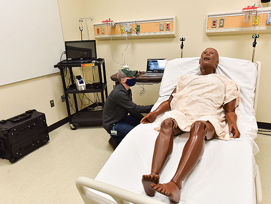 Colton Segars working at the simulation lab