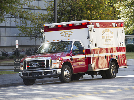 Birmingham Fire and Rescue Service truck parked on street.