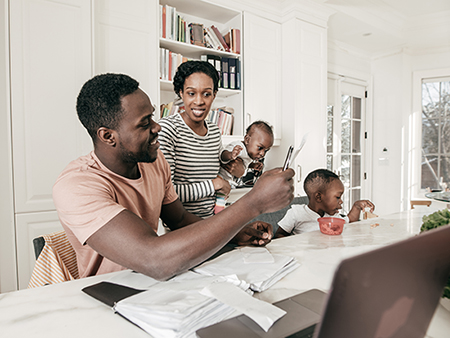 A couple is carefully studying their financial status.