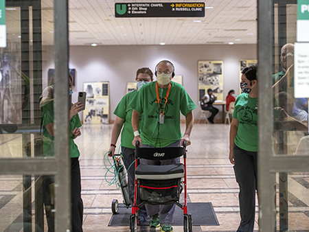 Ricky Hamm exiting doors of UAB Hospital