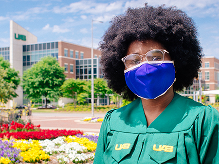 Outdoor headshot of Spring 2021 graduate, Veronica Mixon.