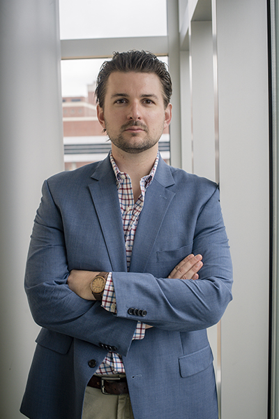 Environmental head shot of Dr. Peter Jones, PhD (Assistant Professor, Government), 2018.