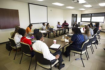 Rev. Calvin Woods addresses the students