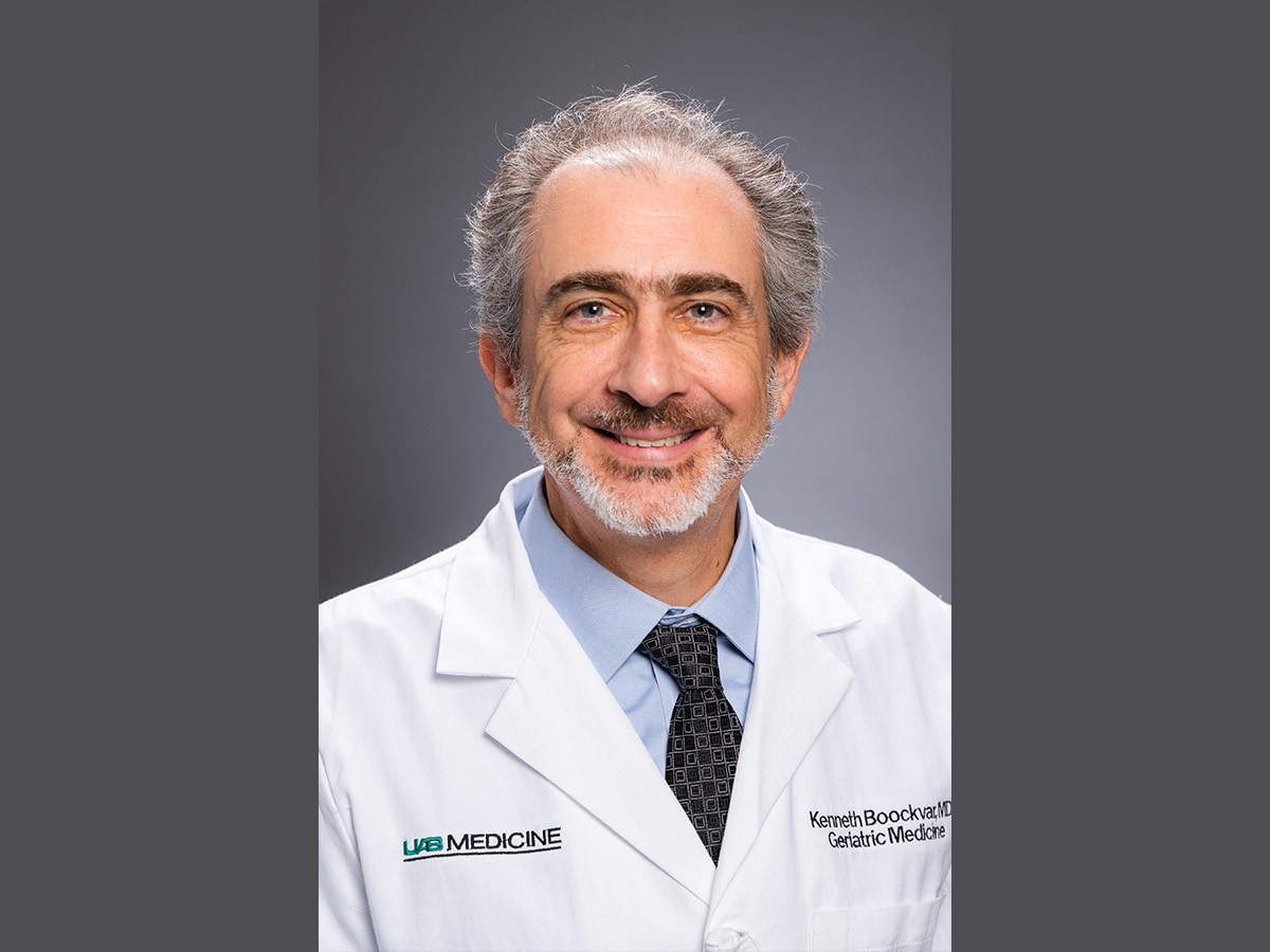 Headshot of Dr. Kenneth Boockvar, MD, Professor of Gerontology, Geriatrics and Palliative Care in white medical coat.