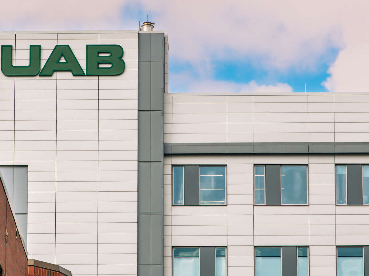Exterior of the UAB Rehabilitation Pavilion showing detail of UAB signage on the facade of the building.
