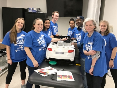 Students design electric toy cars to help special-needs children move and play